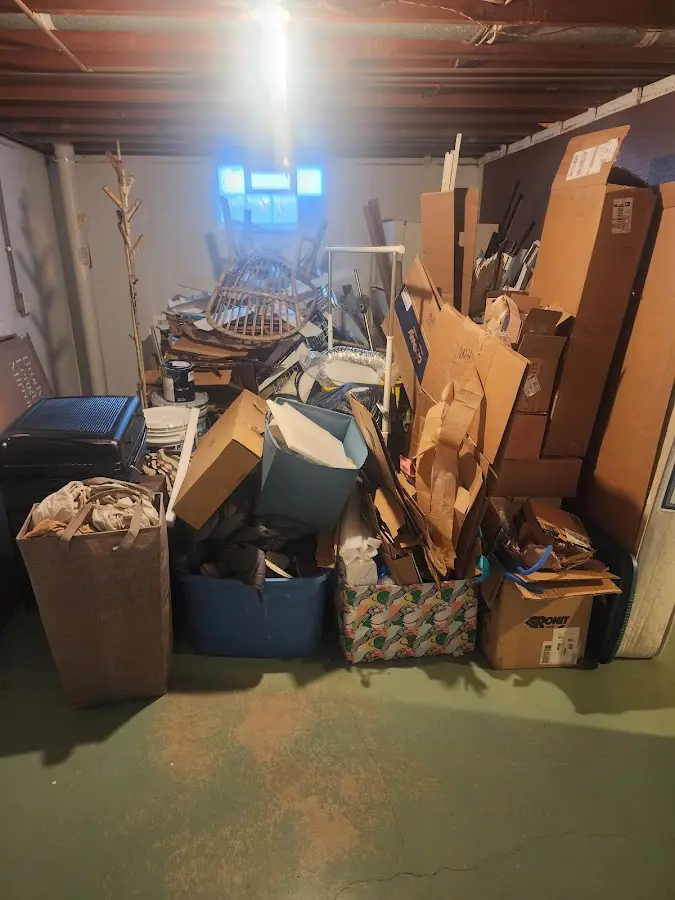 Roll-off dumpster container at job site for 15 Yard Dumpster Rental in Crandall